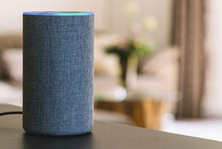 An Amazon Alexa device on a table. Homefinder UK’s property search via voice assistant devices pilot is now live.