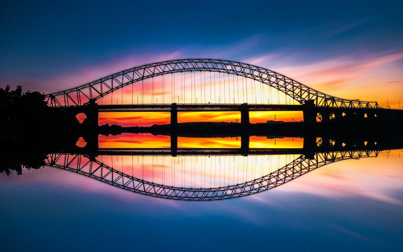 Runcorn Widnes Bridge in Merseyside with striking sunset